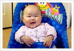 Kiera loves her blue chair