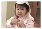 Homminy's pink rain coat